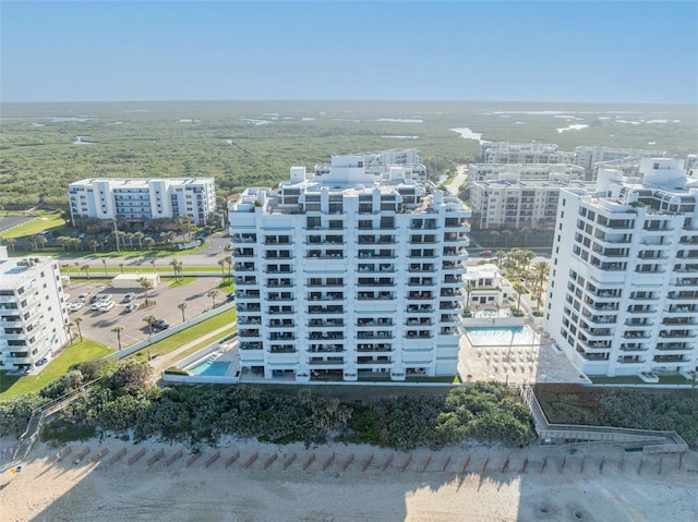 5275 S Atlantic Ave Unit 506, New Smyrna Beach, FL 32169 - aerial view of a pool area and apartment complex
