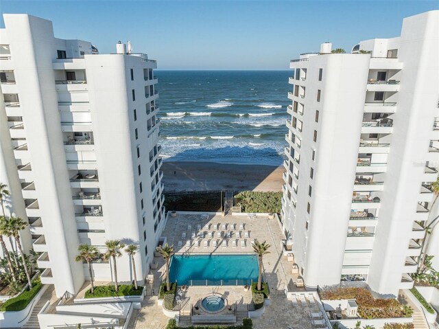 5275 S Atlantic Ave Unit 506, New Smyrna Beach, FL 32169 - view of building exterior with a water view