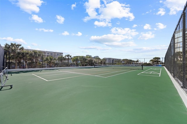 5275 S Atlantic Ave Unit 506, New Smyrna Beach, FL 32169 - view of tennis court featuring community basketball court and fence