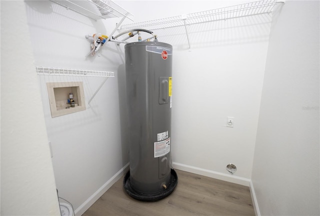 4704 Walden Cir Unit 21, Orlando, FL 32811 - utility room featuring water heater