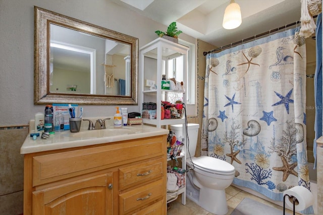 11435 Aries Dr, Orlando, FL 32837 - bathroom featuring toilet, vanity, tile patterned flooring, and a shower with shower curtain