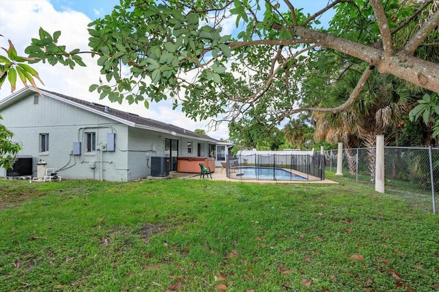 11435 Aries Dr, Orlando, FL 32837 - view of yard featuring a covered hot tub and central AC unit