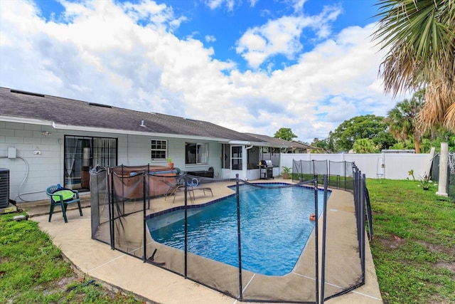 11435 Aries Dr, Orlando, FL 32837 - view of pool featuring a covered hot tub, a patio area, a grill, and cooling unit
