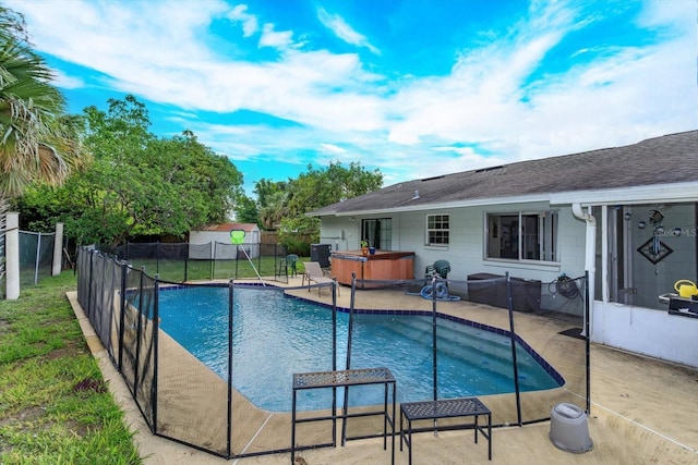 11435 Aries Dr, Orlando, FL 32837 - view of pool featuring a hot tub and a patio area