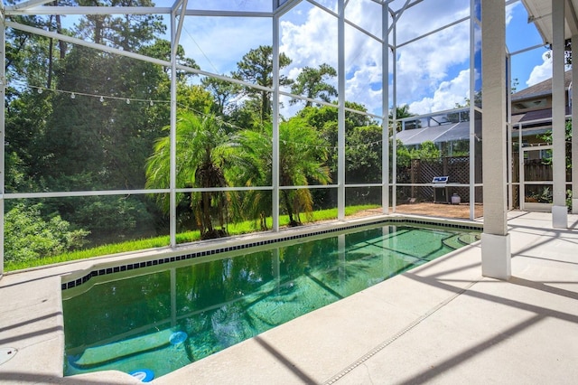 334 N Shadowbay Blvd, Longwood, FL 32779 - swimming pool with glass enclosure and a patio