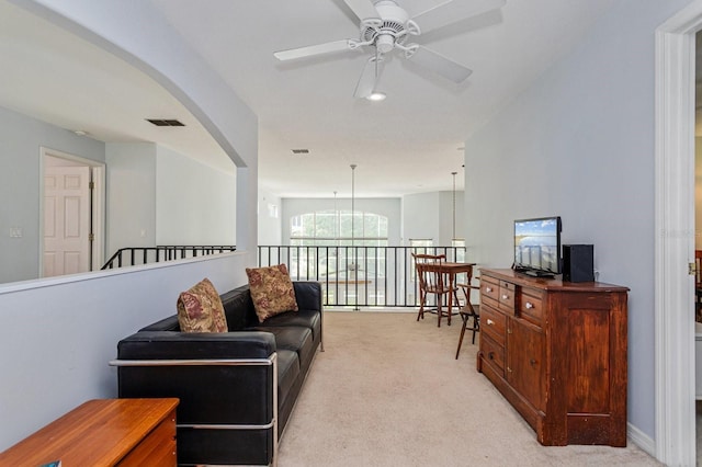 334 N Shadowbay Blvd, Longwood, FL 32779 - living room with a ceiling fan and light colored carpet