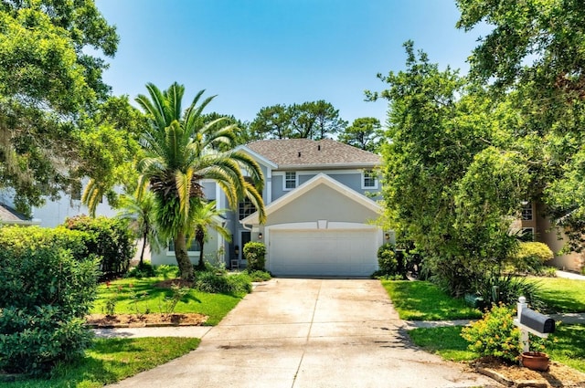 334 N Shadowbay Blvd, Longwood, FL 32779 - view of front of property with stucco siding, concrete driveway, and an attached garage