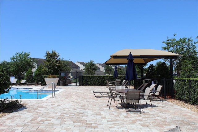 5897 Soter Ln, Windermere, FL 34786 - community pool featuring fence, a patio, and a gazebo
