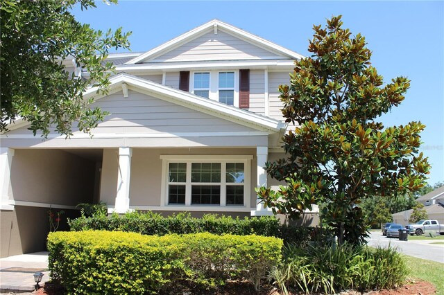 5897 Soter Ln, Windermere, FL 34786 - view of front of house featuring a porch