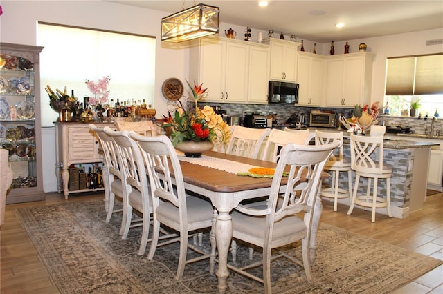 5897 Soter Ln, Windermere, FL 34786 - dining room featuring recessed lighting and light wood-style flooring