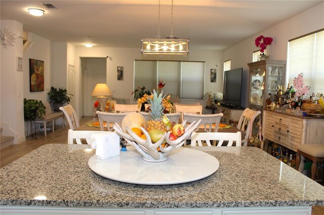 5897 Soter Ln, Windermere, FL 34786 - dining space featuring light wood-style floors