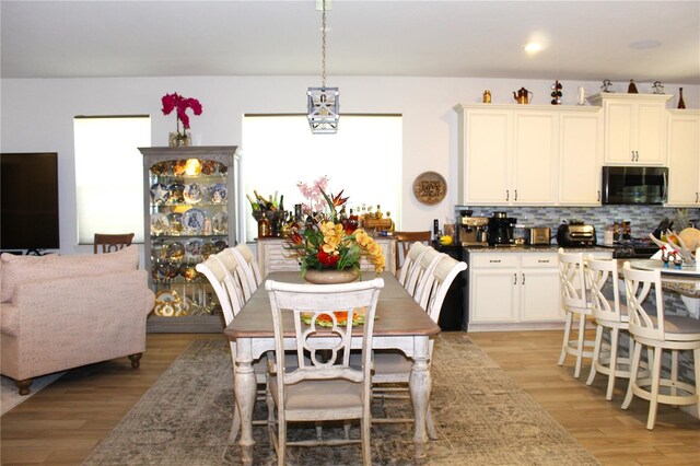5897 Soter Ln, Windermere, FL 34786 - dining space featuring light wood-type flooring