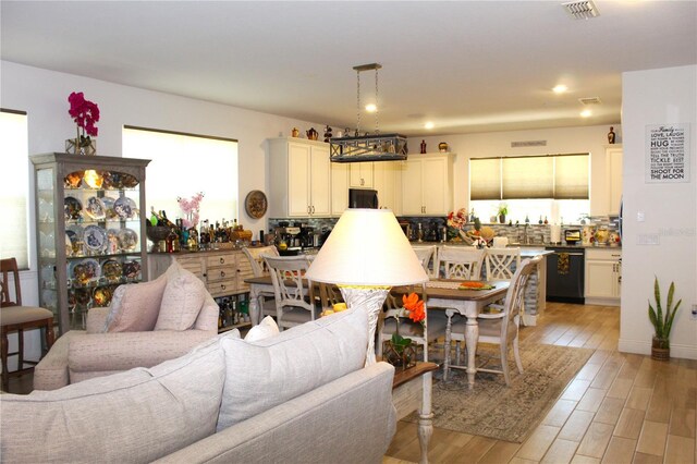 5897 Soter Ln, Windermere, FL 34786 - living area with light wood-style flooring and recessed lighting