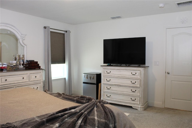 5897 Soter Ln, Windermere, FL 34786 - bedroom featuring carpet floors and freestanding refrigerator