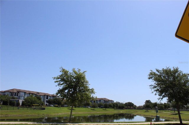 5897 Soter Ln, Windermere, FL 34786 - view of green lawn featuring a water view