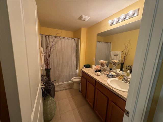 8171 Gopher Tortoise Trl, Lehigh Acres, FL 33974 - bathroom featuring toilet, vanity, a shower with shower curtain, and tile patterned floors