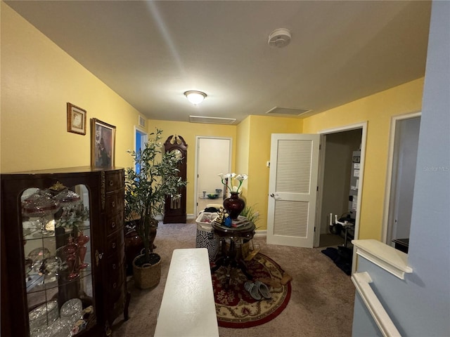 8171 Gopher Tortoise Trl, Lehigh Acres, FL 33974 - entryway with carpet floors and baseboards