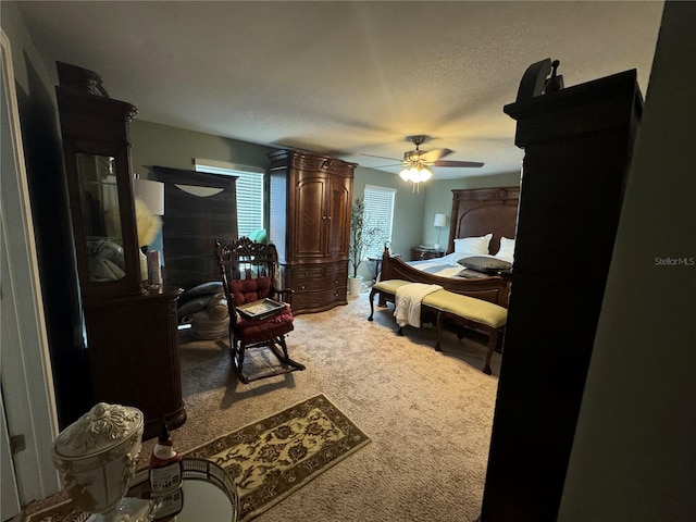 8171 Gopher Tortoise Trl, Lehigh Acres, FL 33974 - bedroom with light carpet and a ceiling fan