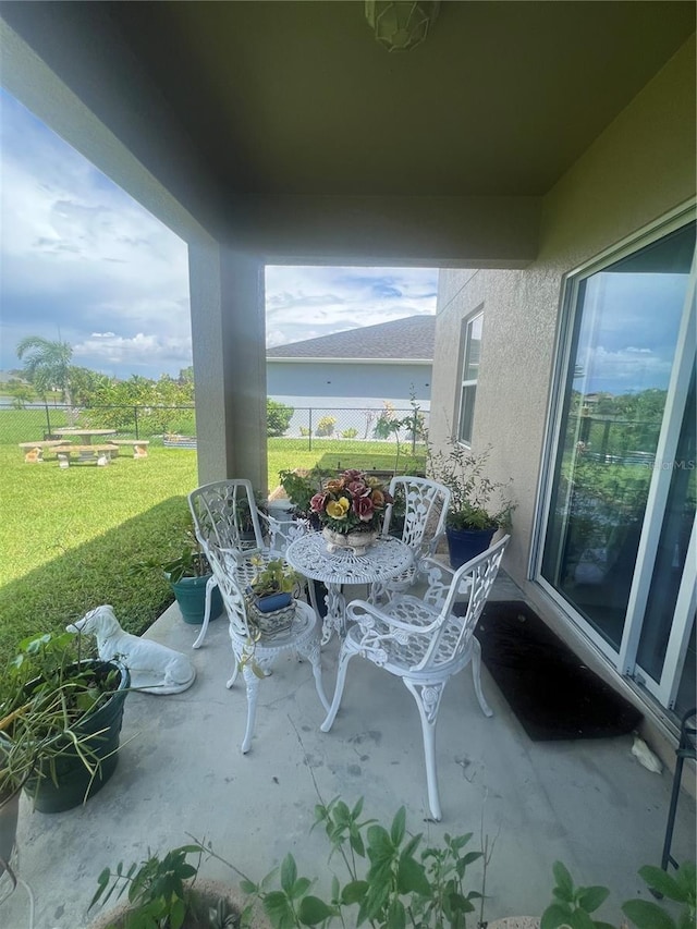 8171 Gopher Tortoise Trl, Lehigh Acres, FL 33974 - balcony featuring a patio area