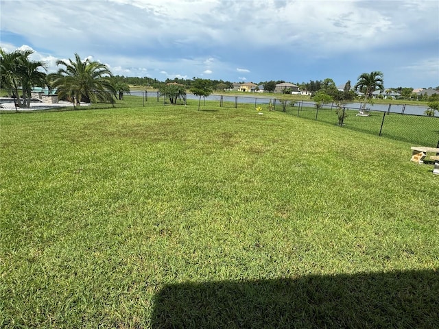 8171 Gopher Tortoise Trl, Lehigh Acres, FL 33974 - view of yard featuring a water view