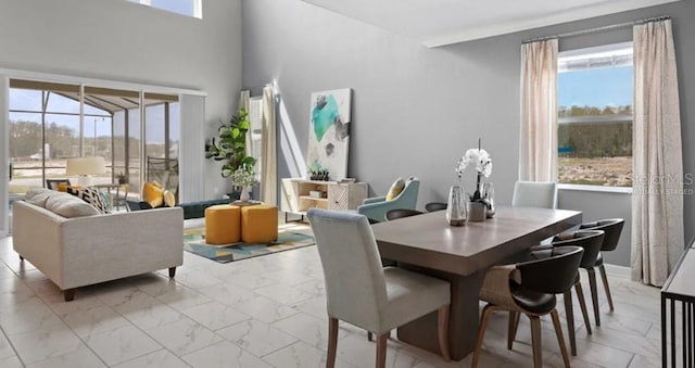 7876 Marlow Pl, Kissimmee, FL 34747 - dining room featuring light marble finish floors