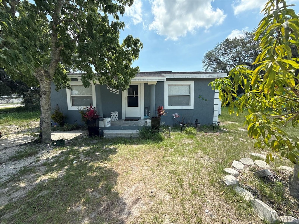 2559 Harry T Moore Ave, Mims, FL 32754 - view of front facade featuring stucco siding