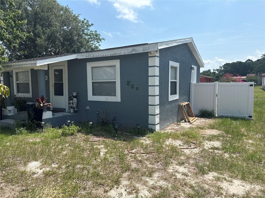 2559 Harry T Moore Ave, Mims, FL 32754 - view of front of property featuring stucco siding