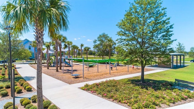 8460 Sperry St, Orlando, FL 32827 - view of home's community with a lawn