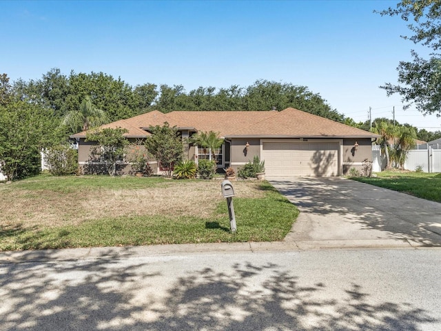 10247 Mason Loop, Clermont, FL 34711 - ranch-style house featuring an attached garage, concrete driveway, and stucco siding