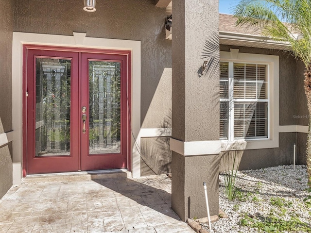 10247 Mason Loop, Clermont, FL 34711 - entrance to property featuring french doors and stucco siding