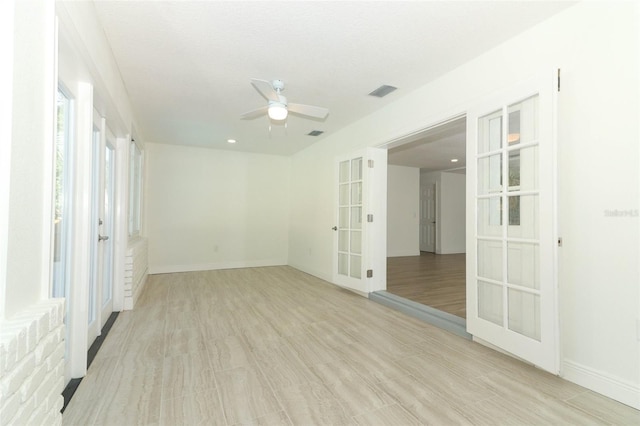 1204 Duncan Ct, Longwood, FL 32779 - empty room with french doors, a ceiling fan, baseboards, and recessed lighting