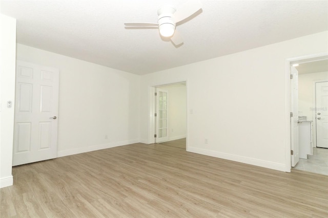 1204 Duncan Ct, Longwood, FL 32779 - empty room with light wood finished floors, a ceiling fan, and baseboards