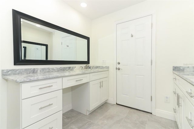 1204 Duncan Ct, Longwood, FL 32779 - bathroom with baseboards, vanity, and recessed lighting