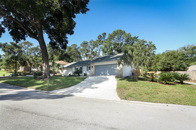 1204 Duncan Ct, Longwood, FL 32779 - ranch-style home with a garage and concrete driveway