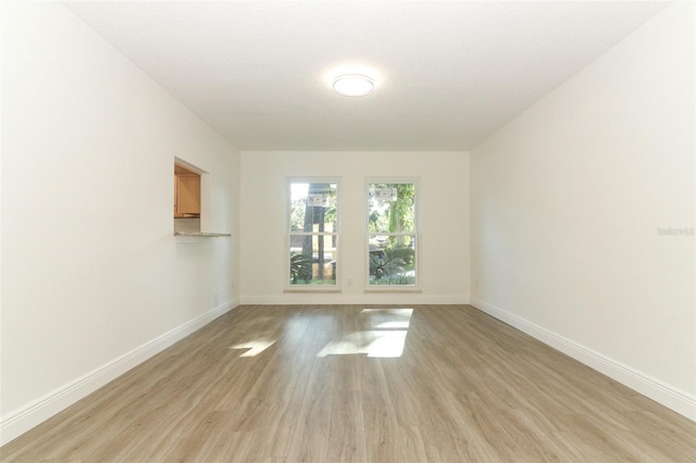 1204 Duncan Ct, Longwood, FL 32779 - unfurnished room with baseboards and light wood finished floors