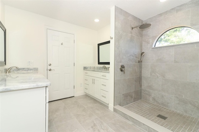 1204 Duncan Ct, Longwood, FL 32779 - full bath featuring tiled shower, two vanities, and recessed lighting