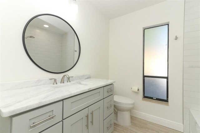 1204 Duncan Ct, Longwood, FL 32779 - full bathroom with vanity, a shower, wood finished floors, and a tub to relax in