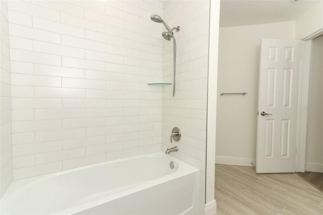 1204 Duncan Ct, Longwood, FL 32779 - full bath featuring washtub / shower combination and wood finished floors