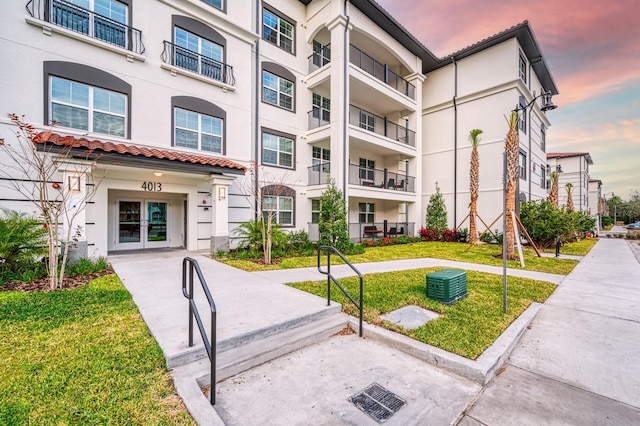 4013 Breakview Dr Unit A407, Orlando, FL 32819 - view of property at dusk
