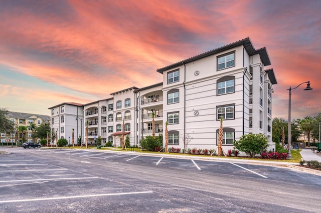 4013 Breakview Dr Unit A407, Orlando, FL 32819 - view of building exterior featuring uncovered parking