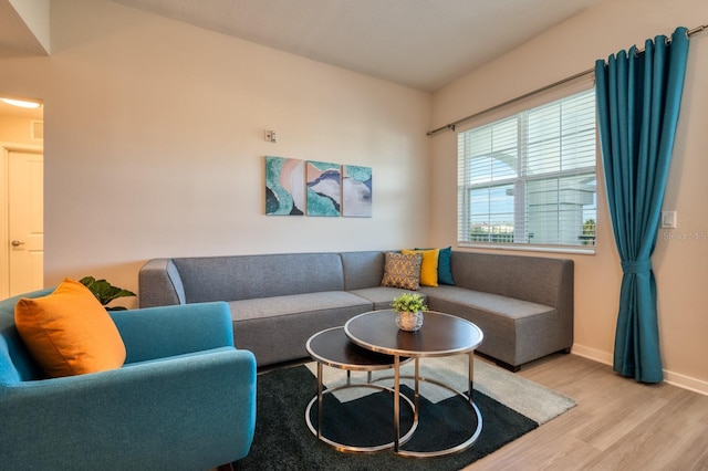4013 Breakview Dr Unit A407, Orlando, FL 32819 - living area featuring wood finished floors and baseboards
