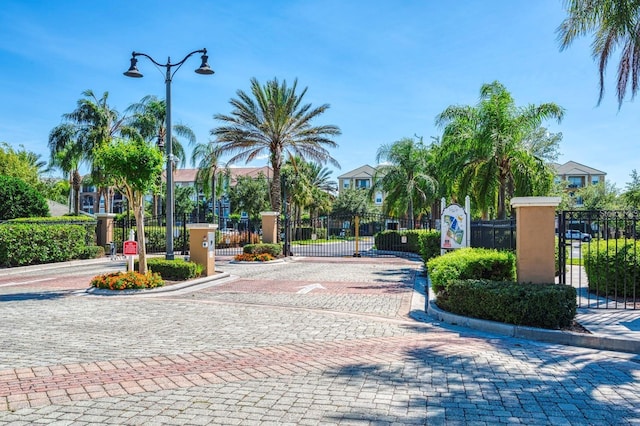 4013 Breakview Dr Unit A407, Orlando, FL 32819 - view of property's community with a gate and fence