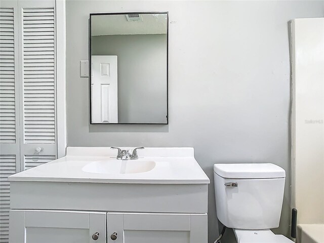 8228 Shriver Dr, Orlando, FL 32822 - bathroom with vanity and toilet