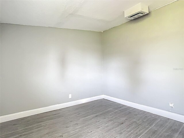 8228 Shriver Dr, Orlando, FL 32822 - unfurnished room with wood finished floors and baseboards