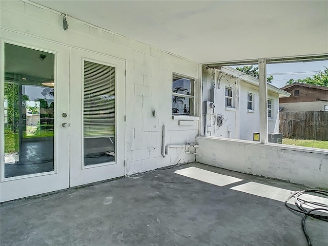 8228 Shriver Dr, Orlando, FL 32822 - unfurnished sunroom featuring french doors