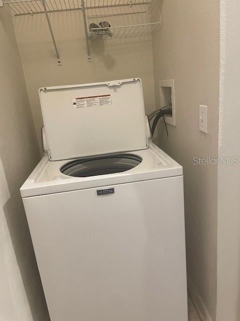 417 Southern Pecan Cir Unit 201, Winter Garden, FL 34787 - laundry area with washer / clothes dryer