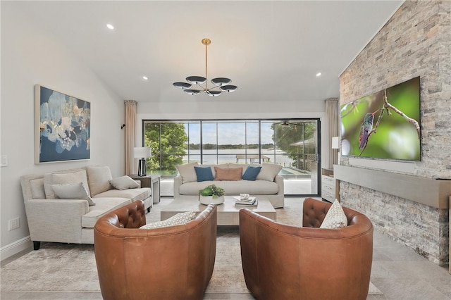 living area featuring vaulted ceiling, a chandelier, recessed lighting, and baseboards