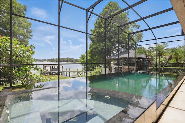 outdoor pool featuring a water view