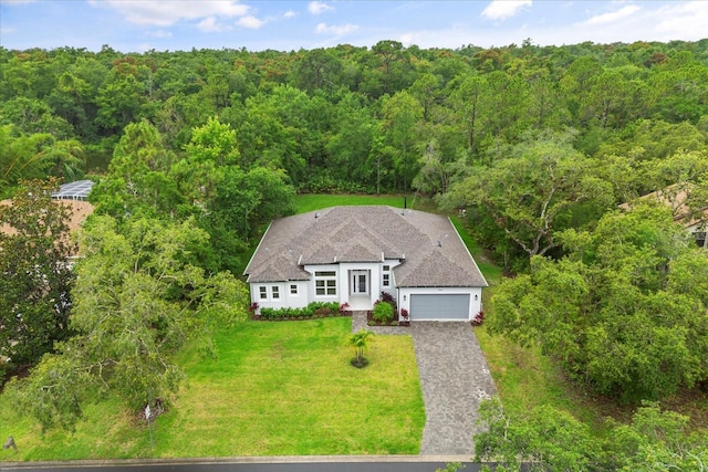4528 Yorkshire Ln, Kissimmee, FL 34758 - view of subject property featuring a forest