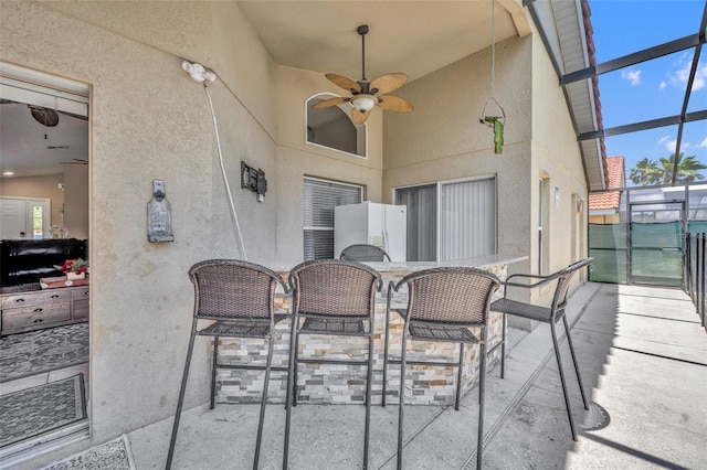view of patio / terrace featuring a ceiling fan